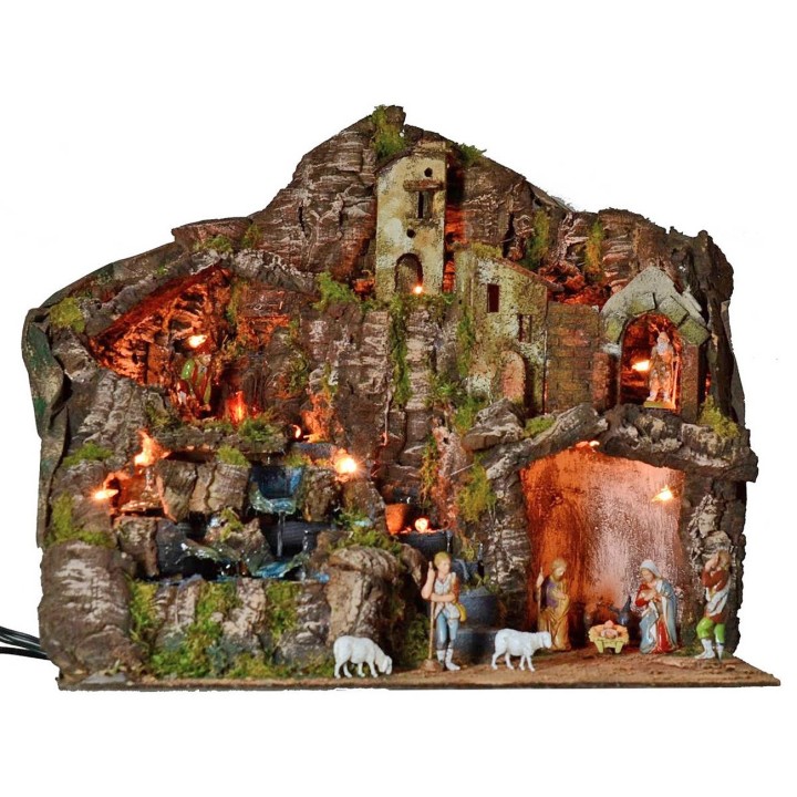 Illuminated nativity scene complete with Landi statues with fire and waterfall