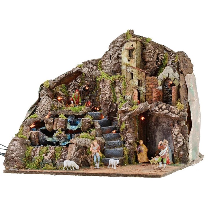 Illuminated nativity scene complete with Landi statues with fire and waterfall