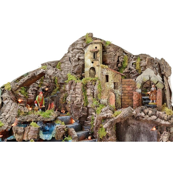Illuminated nativity scene complete with Landi statues with fire and waterfall