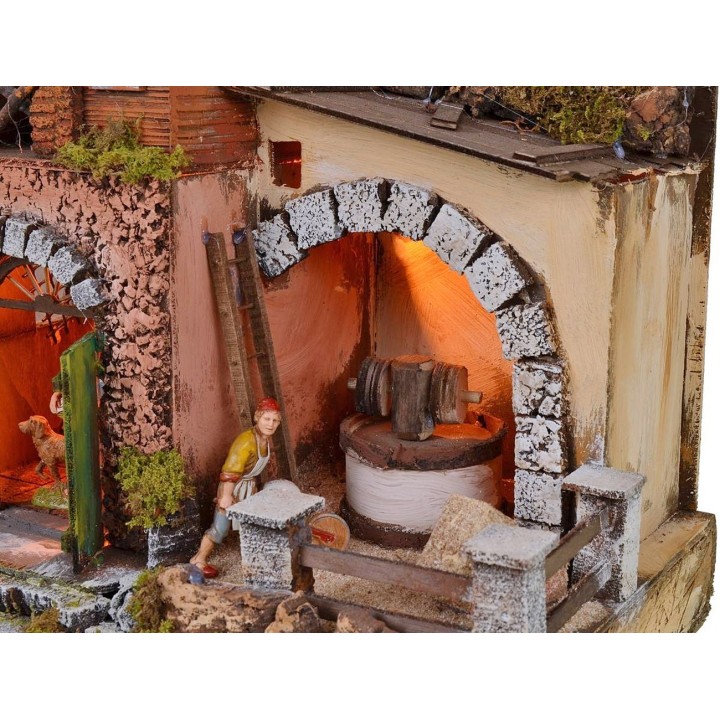 Presepe illuminato completo di statue Landi con macina