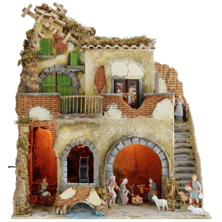 Pesebre iluminado completo con estatuas Landi con molino de agua