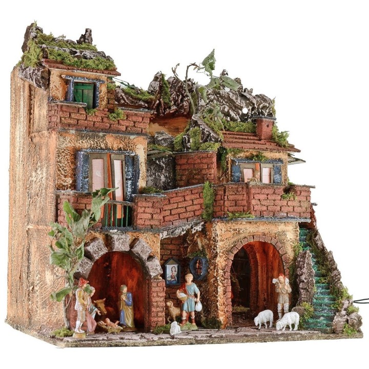 Illuminated nativity scene complete with Landi statues with mirror