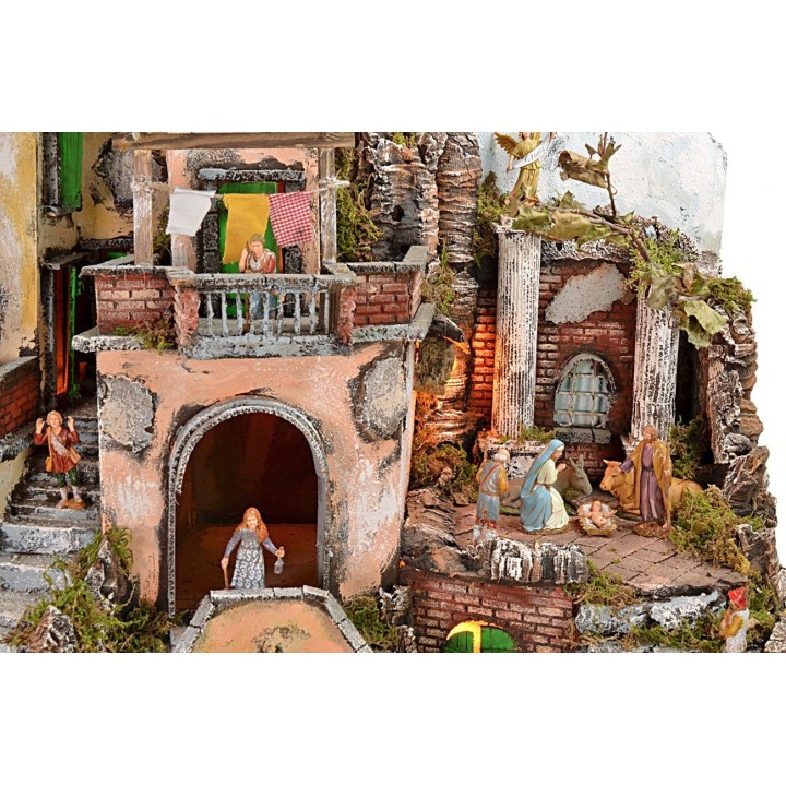 Presepe illuminato con fontana e fuoco funzionante completo di
