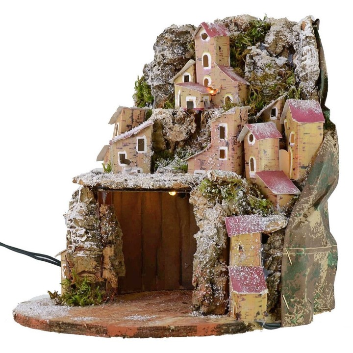 Presepe innevato illuminato con villaggio e grotta cm 20x20x24 h