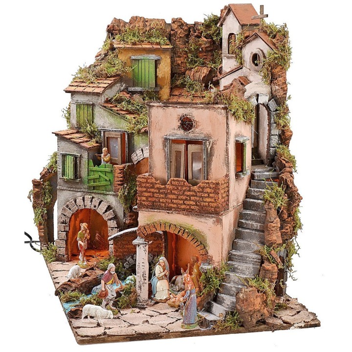 Illuminated Neapolitan nativity scene complete with Landi statues