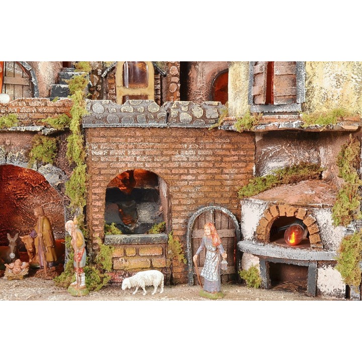 Pesebre napolitano iluminado con horno, cascada y molino