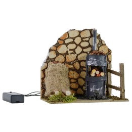 Escenario para castañera con horno en funcionamiento de