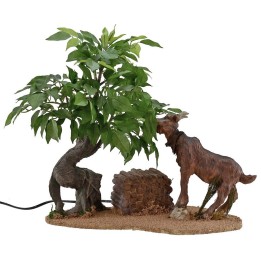 Capra marrone che mangia serie 30 cm in movimento