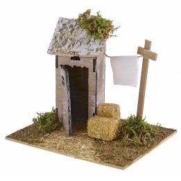 Setting with latrine and wooden drying rack for nativity scene