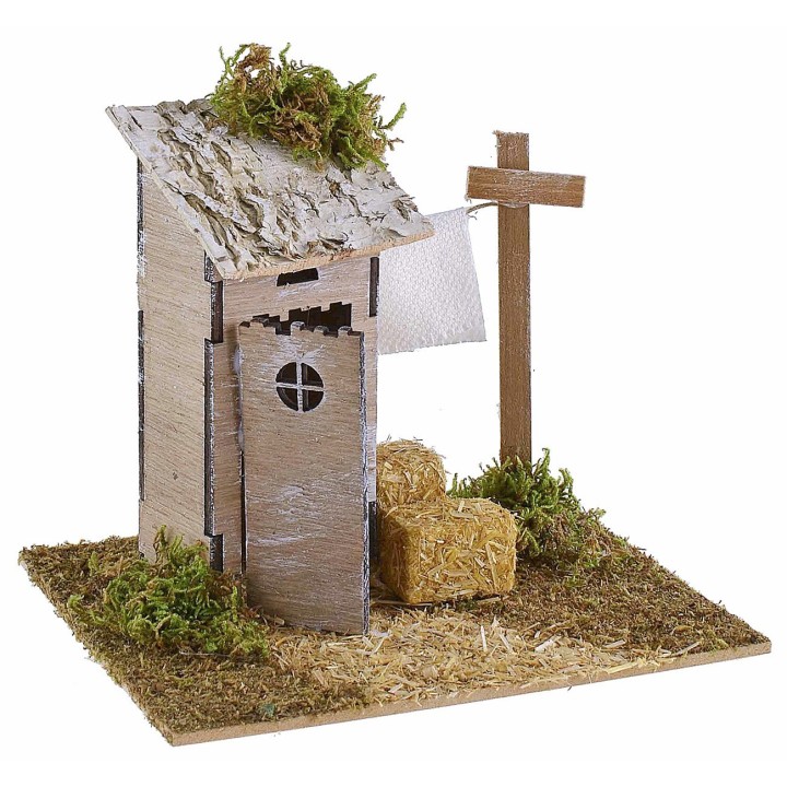 Setting with latrine and wooden drying rack for nativity scene