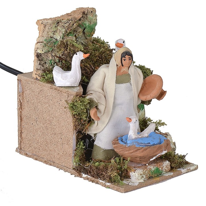 Campesina con gansos en movimiento 10 cm