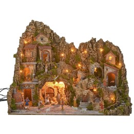 Pesebre iluminado con cueva, fuente, cascada y fuego