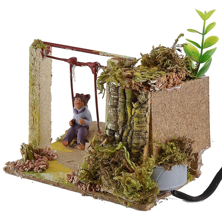 Bambino sull'altalena serie 10 cm in movimento