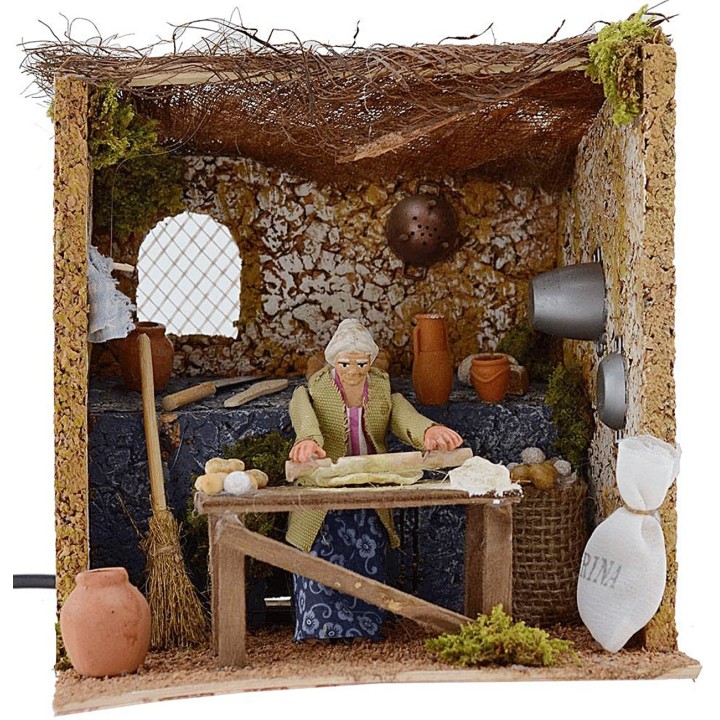 Donna 10 cm che impasta in movimento 18x20x18 h.