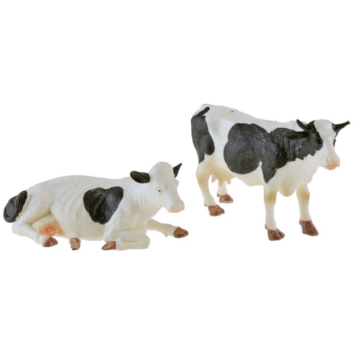 Coloca 2 vacas moteadas en PVC