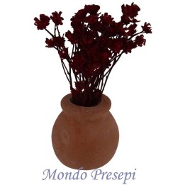 Vaso in terracotta con fiori bordeux