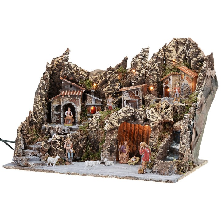 Illuminated nativity scene with working oven and waterfall complete with