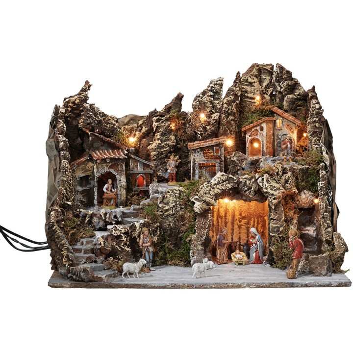 Illuminated nativity scene with working oven and waterfall complete with
