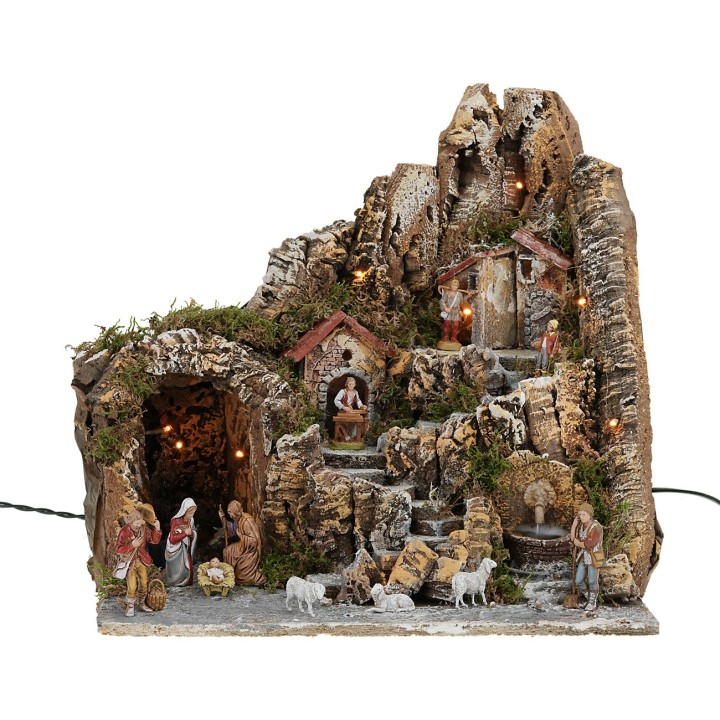 Presepe illuminato con fontana funzionante completo di statue
