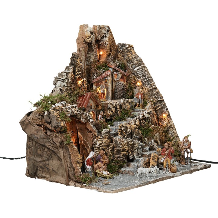 Presepe illuminato con fontana funzionante completo di statue