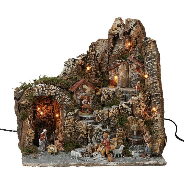 Presepe illuminato con fontana funzionante completo di statue