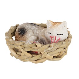Cat in assorted patterns sleeping in a basket Ø 4 cm