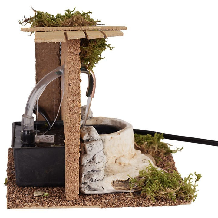 Stone fountain powered by electricity for nativity scene