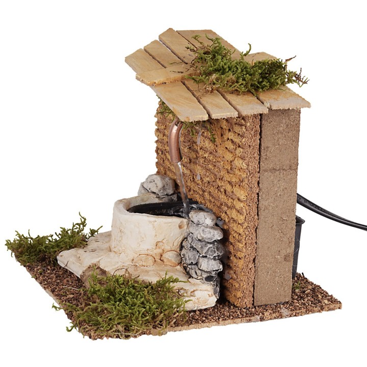 Stone fountain powered by electricity for nativity scene