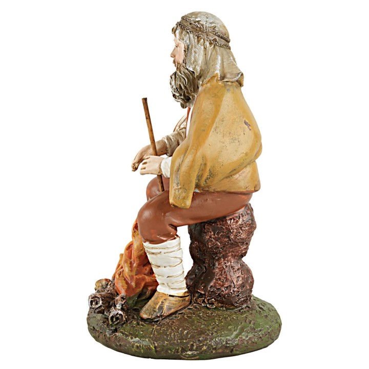 Pastor sentado frente al fuego serie 10 cm en resina Landi