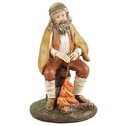 Pastor sentado frente al fuego serie 12 cm en resina Martino