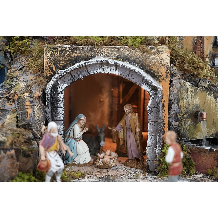 Presepe illuminato completo di statue con cascata, fontana e