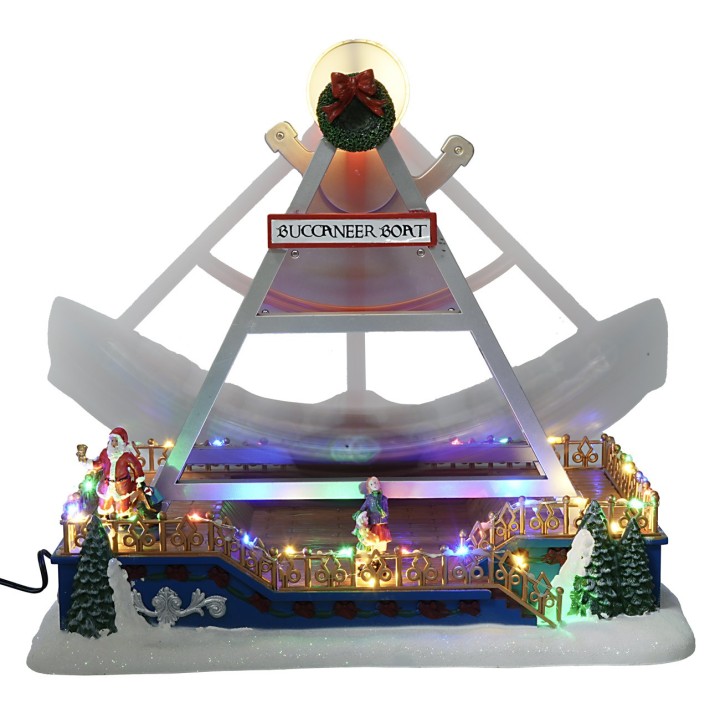Christmas carousel with rocking ship complete with lights and
