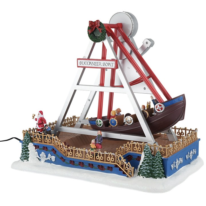 Christmas carousel with rocking ship complete with lights and