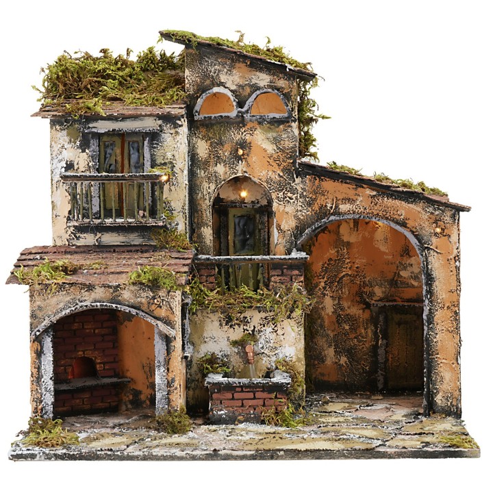 Presepe illuminato con fontana e forno funzionanti cm 46x32x45h