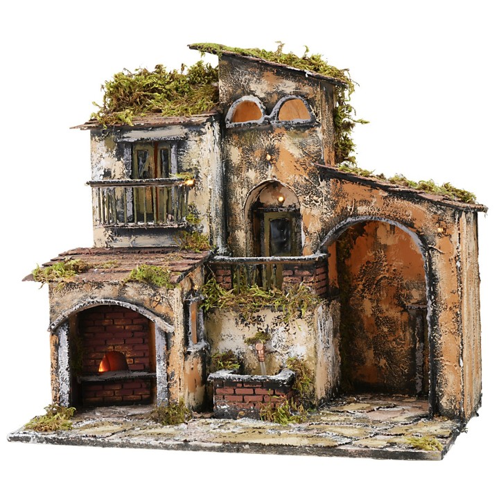 Nacimiento iluminado con fuente y horno funcionando cm 46x32x45h