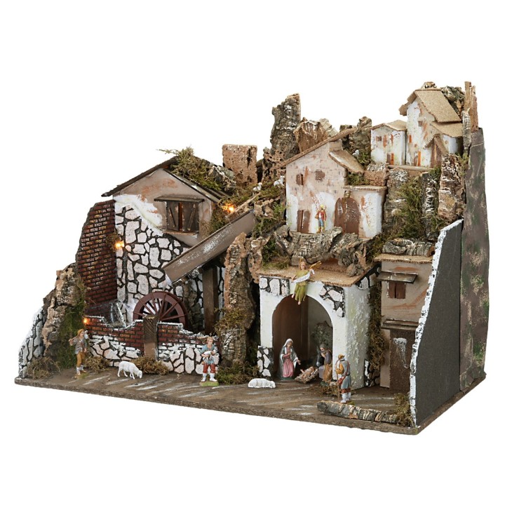 Presepe con statue illuminato con mulino completo di pompa a