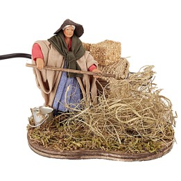Peasant woman spreading straw in motion, 10 cm