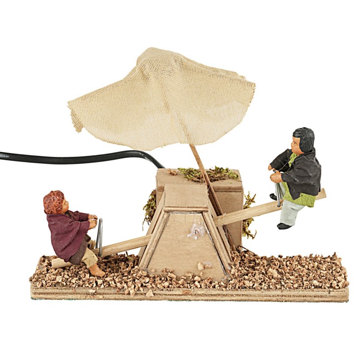 Niños en el columpio en movimiento 12 cm