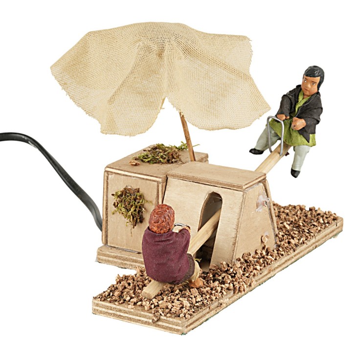 Children on the swing in motion 12 cm