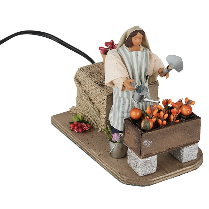 Woman watering 12 cm in motion