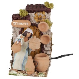 Woman selling terracotta 10 cm in movement