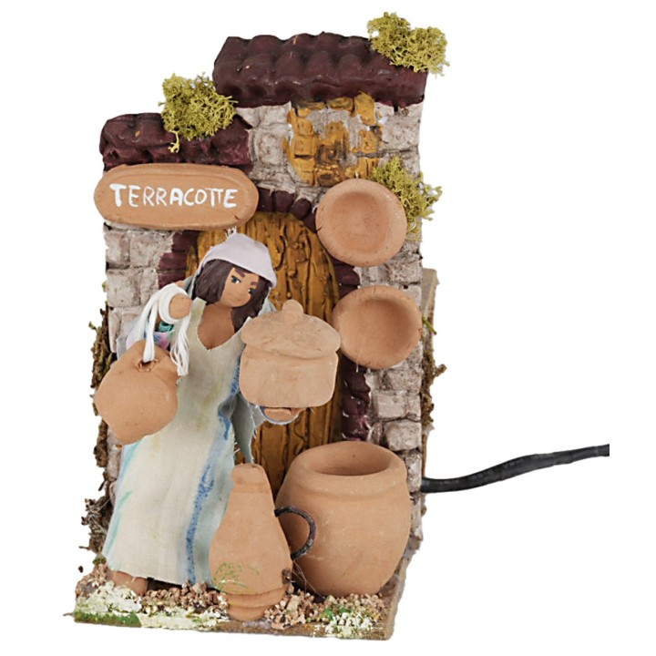 Mujer que vende terracota 10 cm en movimiento