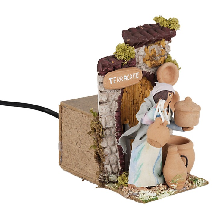 Donna che vende terracotta 10 cm in movimento