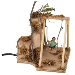 Bambino su altalena serie 10 cm in movimento