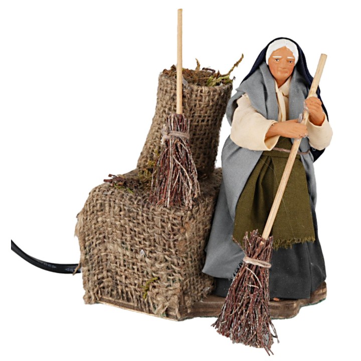 Woman with broom 12 cm in motion