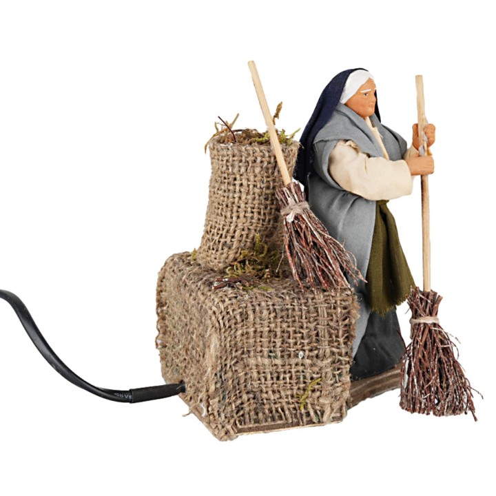 Woman with broom 12 cm in motion