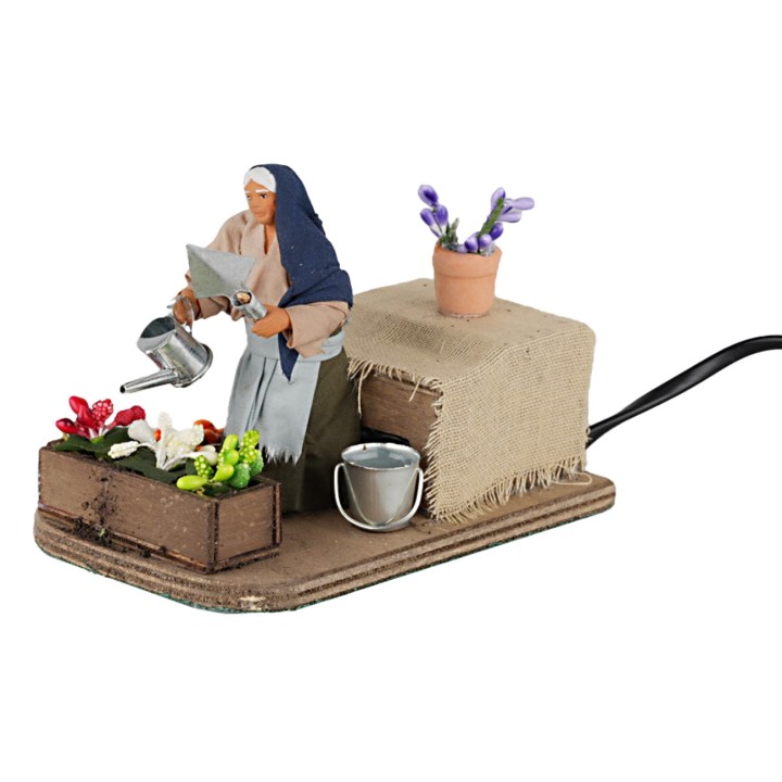 Donna che annaffia 10 cm in movimento
