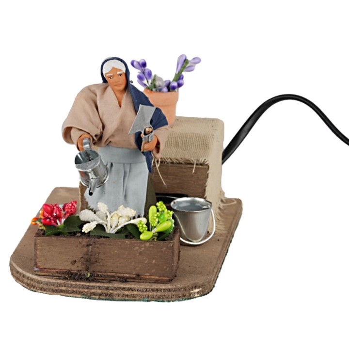 Donna che annaffia 10 cm in movimento