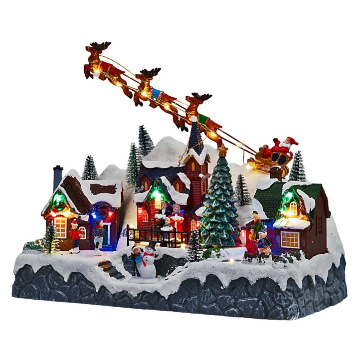 Christmas scene with Santa Claus on a sleigh pulled by reindeer