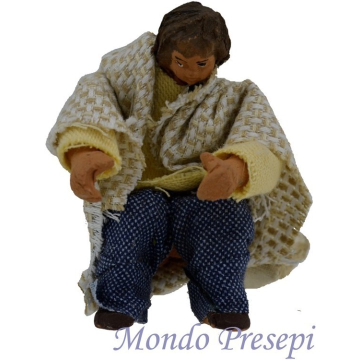 Bambino seduto terracotta vestito snodato